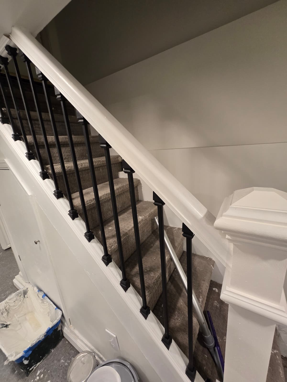 Basement staircase and railing renovation by MeyMax Construction LLC
