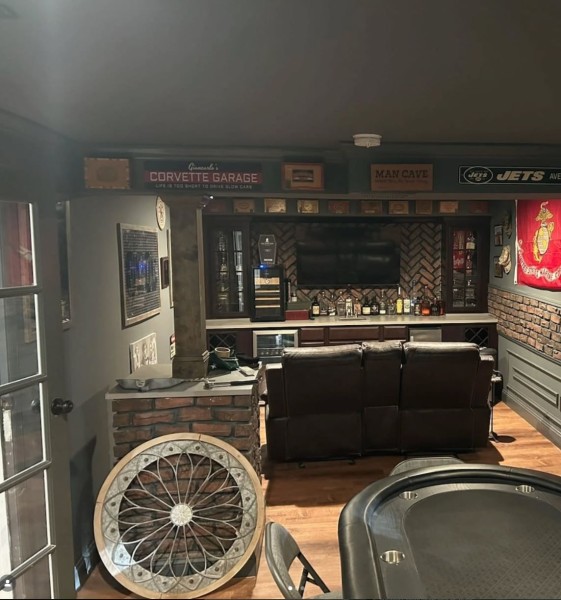 Finished basement man cave with bar and lounge by MeyMax Construction LLC
