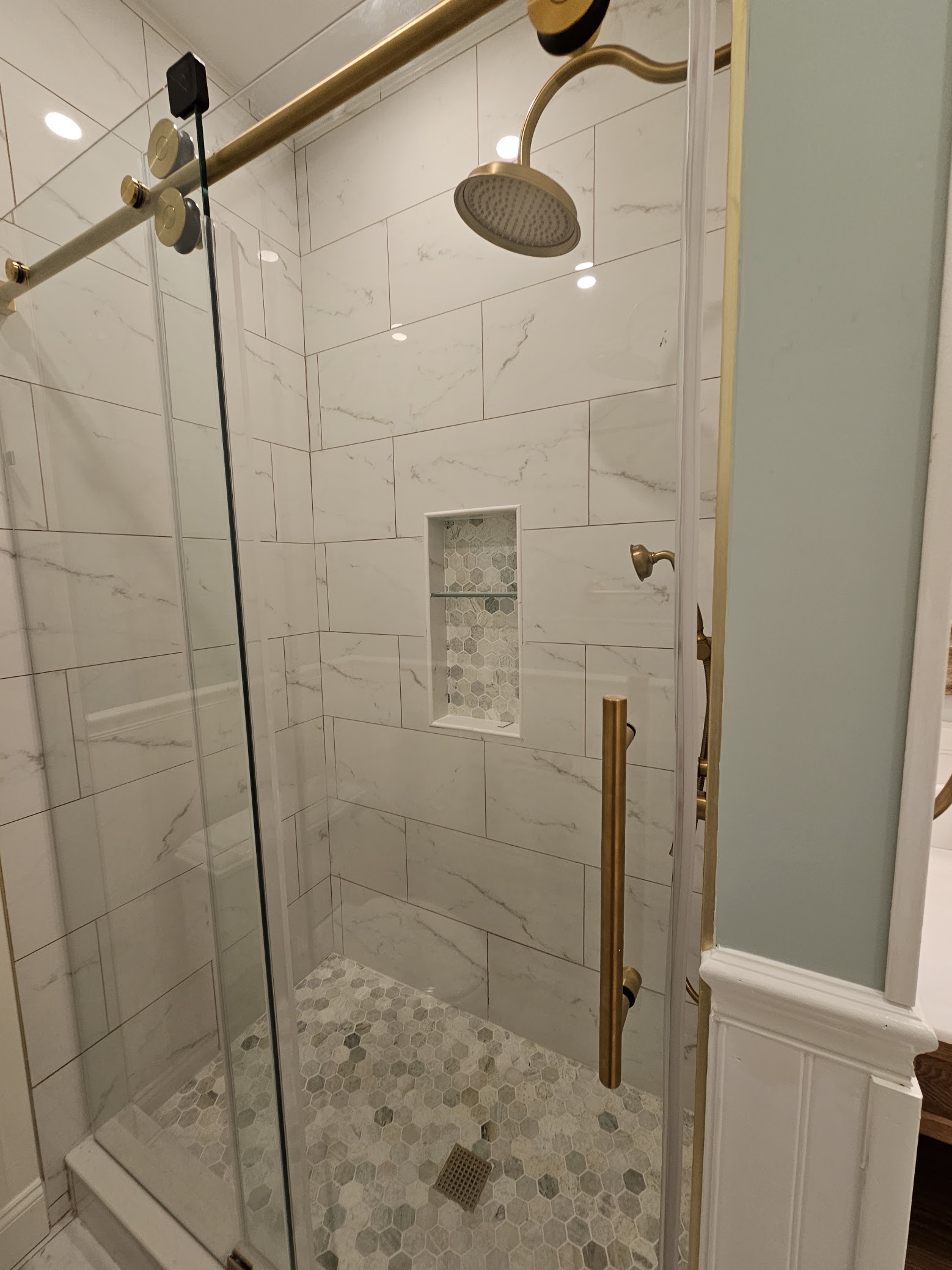 Bathroom remodel with new fixtures by MeyMax Construction LLC