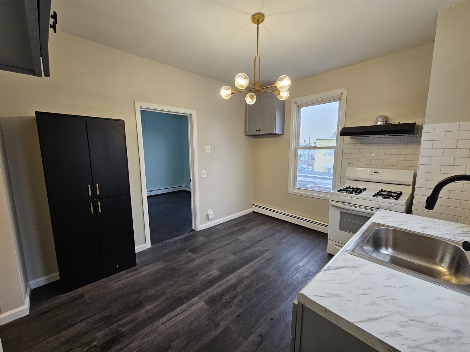 Compact kitchen renovation by MeyMax Construction LLC