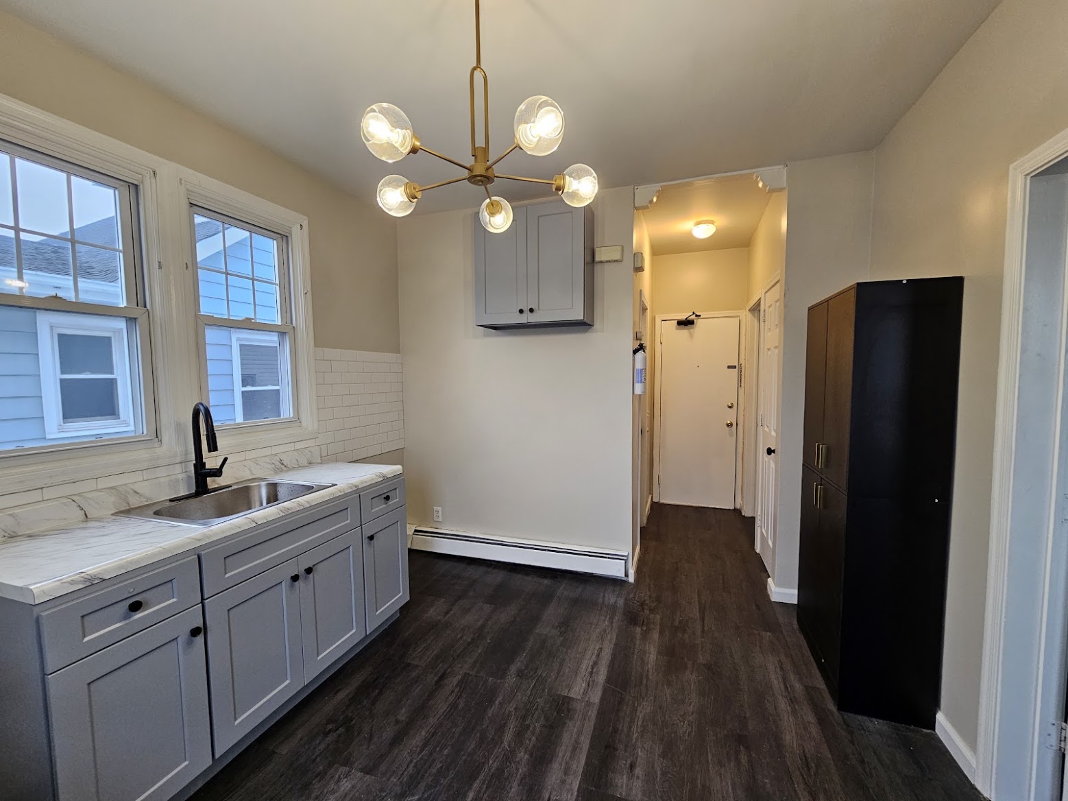 Small kitchen remodel with new finishes by MeyMax Construction LLC
